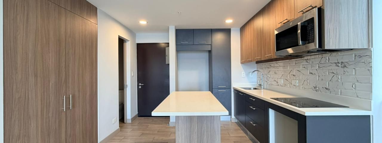 APARTAMENTO EN ALQUILER BE CARIARI UN DORMITORIO CON PARQUEO — photo 1 of 20