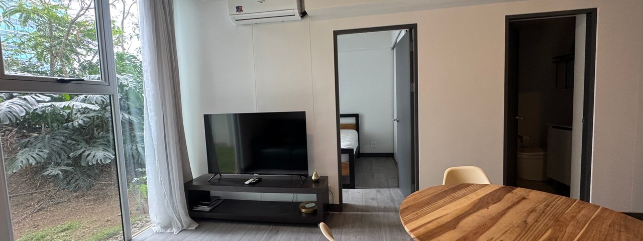 Apartamento amueblado de dos dormitorios y parqueo en Secret Sabana — photo 1 of 15