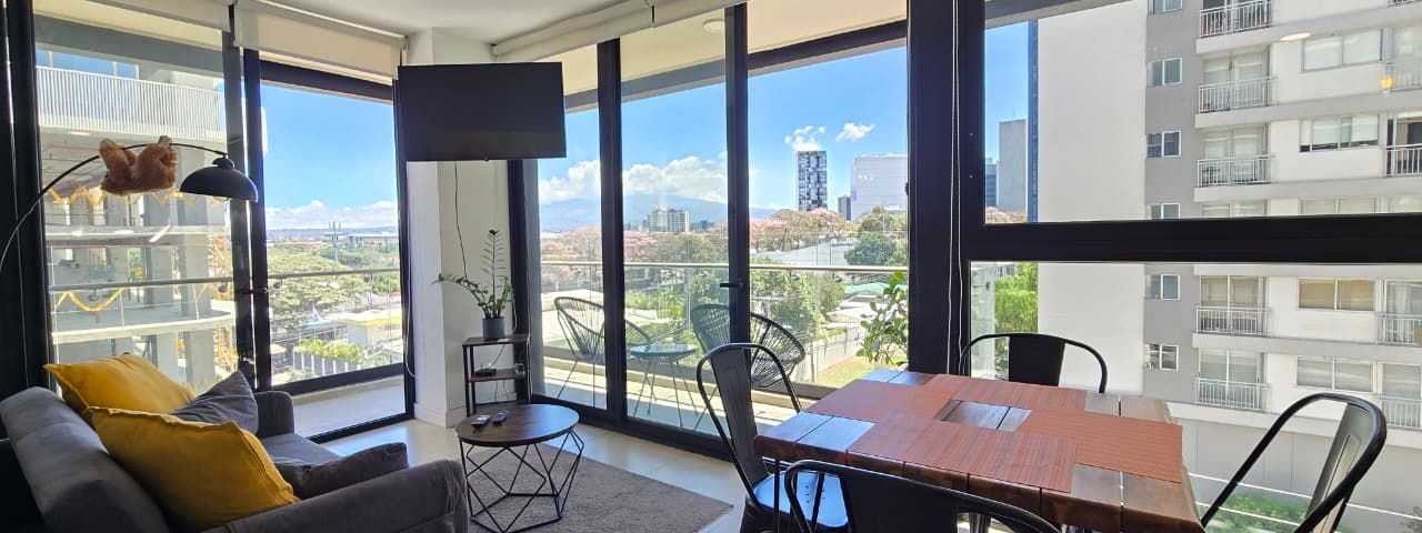 APARTAMENTO CON DOBLE VISTA 1 DORMITORIO AMUEBLADO Y CON PARQUEO — photo 1 of 18