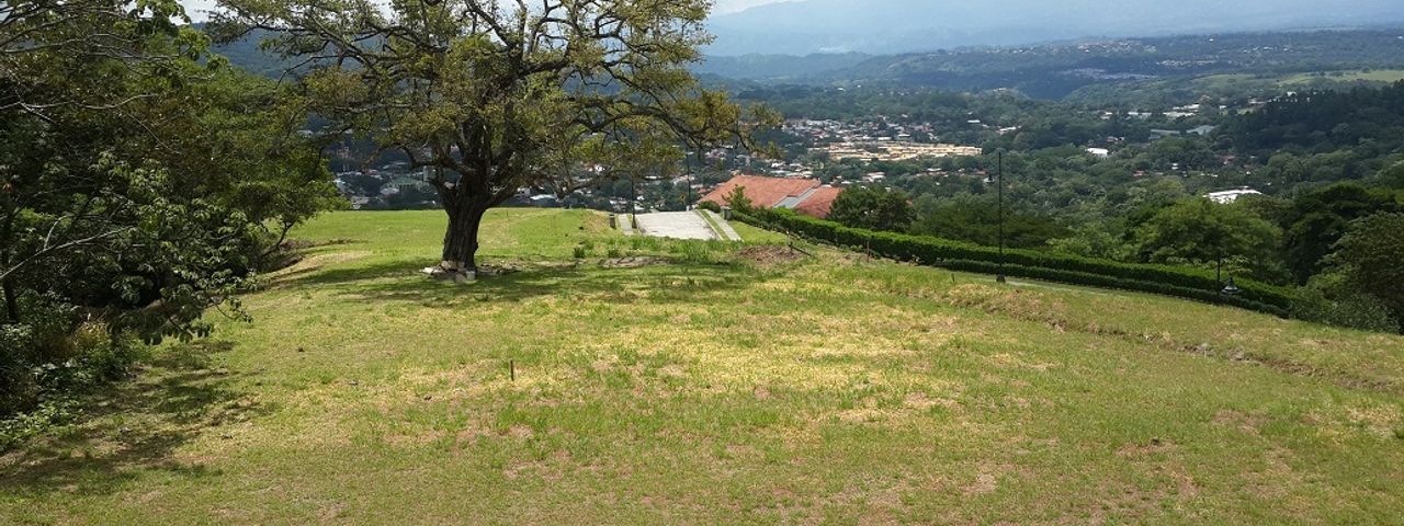 VENTA Gran lote en condominio en Ciudad Colón — photo 1 of 14