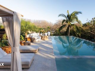 SILVESTRE BRANDED RESIDENCES- BEACH FRONT IN MAIN GUIONES — photo 5 of 6