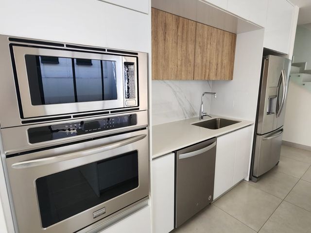 Oportunidad de Inversión: Casa Moderna en Santa Ana con Rentabilidad Inmediata — photo 6 of 18
