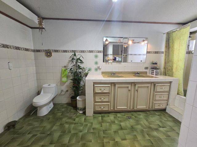 Venta de Casa en Residencial Montenegro, Alajuela — photo 7 of 18