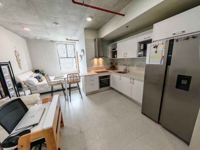 Venta de apartamento tipo estudio en piso 24 con parqueo en Torre URBN Escalante, San José — foto 2 de 5