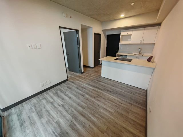 Venta de apartamento a estrenar con parqueo en piso 8, Torre Scret Sabana, San José — foto 2 de 5