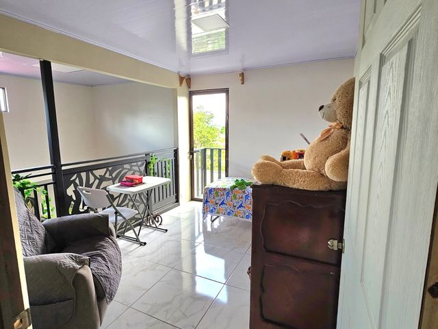 Hermosa casa de dos pisos — photo 4 of 20