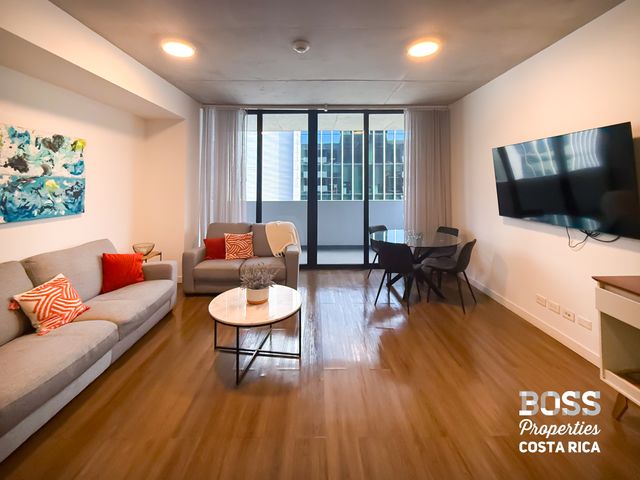 Living room — Apartamento Amueblado de 2 Habitaciones en Venta – Escazú Village | Terraza + Vista al Este, photo 11 of 18