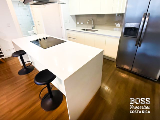 Living room — Apartamento Amueblado de 2 Habitaciones en Venta – Escazú Village | Terraza + Vista al Este, photo 8 of 18