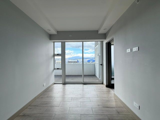 APARTAMENTO EN ALQUILER BE CARIARI UN DORMITORIO CON PARQUEO — photo 2 of 20