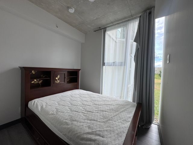 Apartamento amueblado de dos dormitorios y parqueo en Secret Sabana — photo 3 of 15
