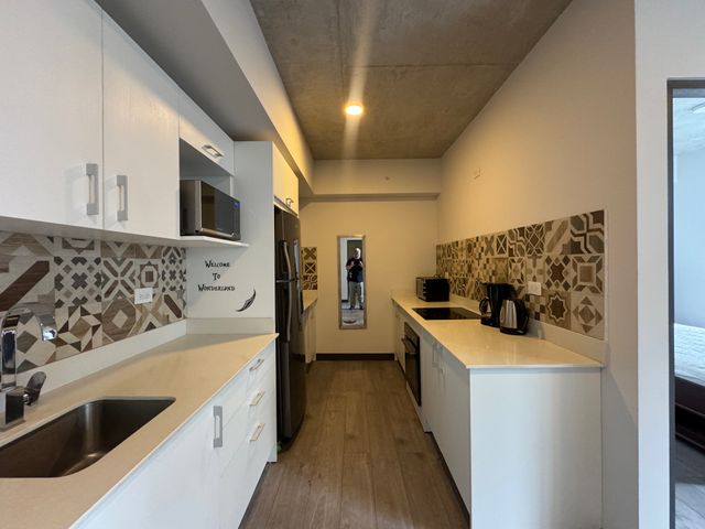 Apartamento amueblado de dos dormitorios y parqueo en Secret Sabana — photo 14 of 15