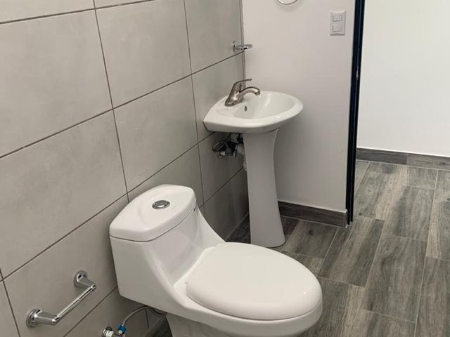 Oportunidad de Inversión Inmobiliaria / 3 Apartamentos generando ganancias — photo 8 of 17