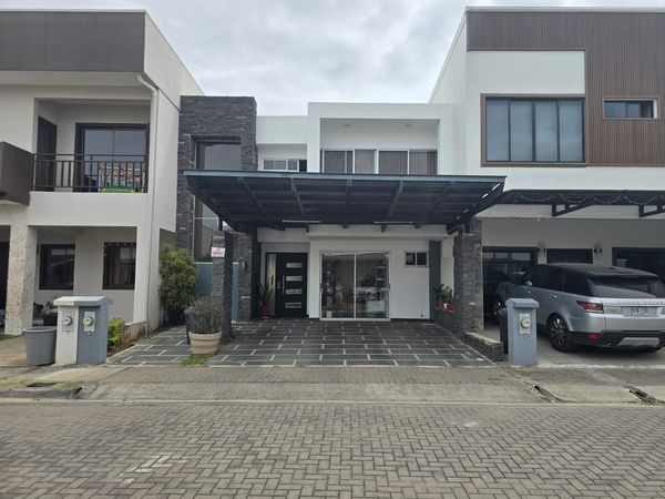 VENTA DE CASA EN CONDOMINIO HACIENDA EL COYOL, ALAJUELA, Condominio Hacienda El Coyol, Alajuela Province, San José, El Coyol, Costa Rica — photo 1 of 5